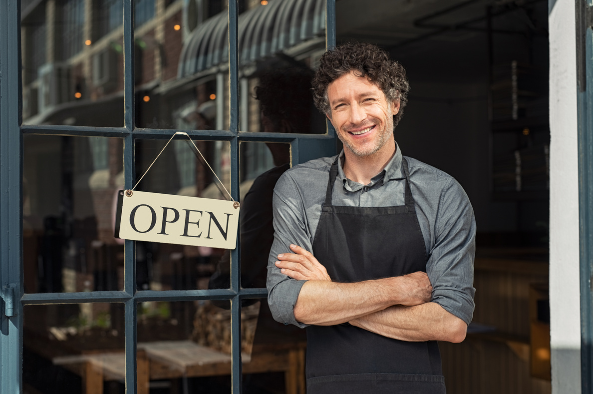 Owner Standing outside Restaurant